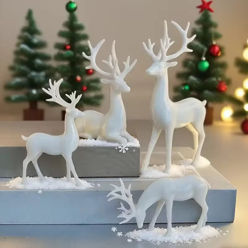 White Reindeer Figurine Set — 4-Piece Christmas Decoration