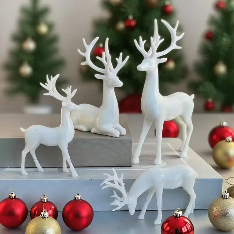 White Reindeer Figurine Set — 4-Piece Christmas Decoration